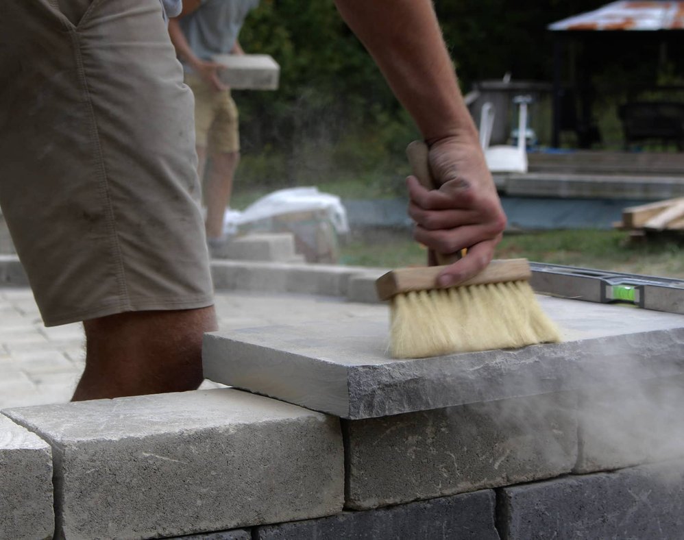 ExCL crew working on a hardscape installation
